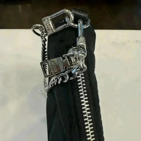 NWOT Steve Madden wristlet black quilted with silver hardware. - Picture 3 of 14